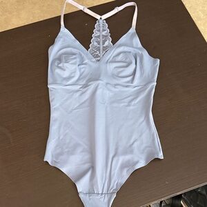 Chic Light Blue Bodysuit with Lace Accent